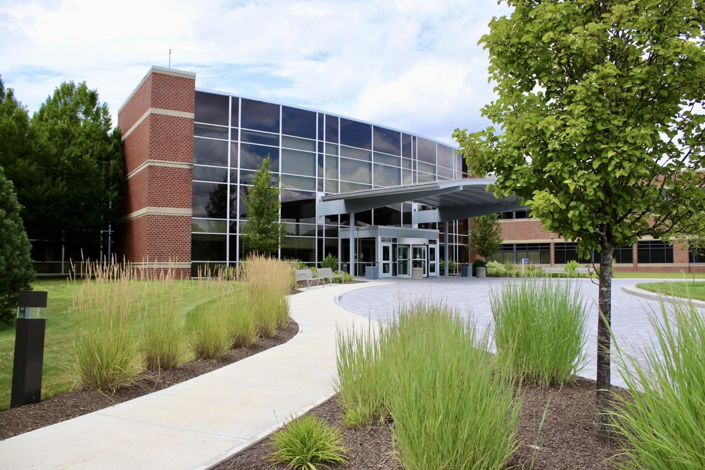 Mulch in landscape beds preventing weeds along walkway